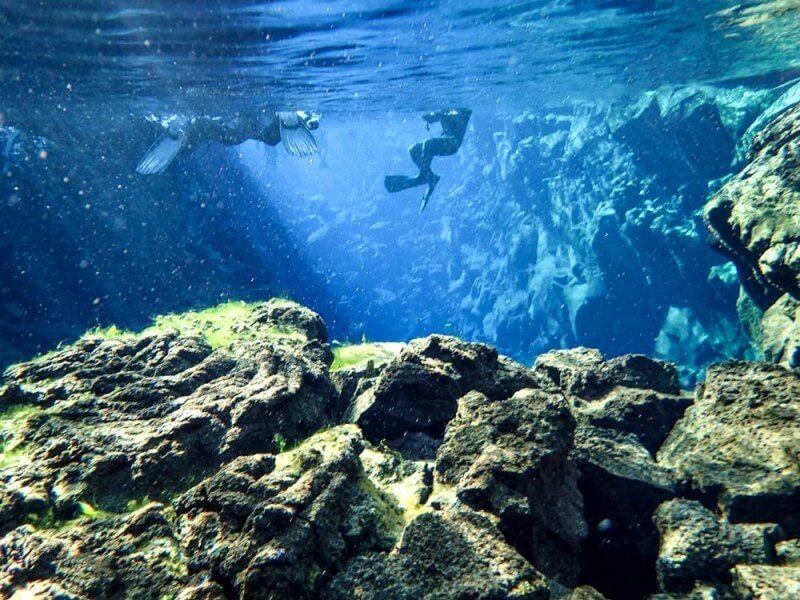Snorkeling in Iceland is an amazing experience - Pic by Carol from Wayfaring Views