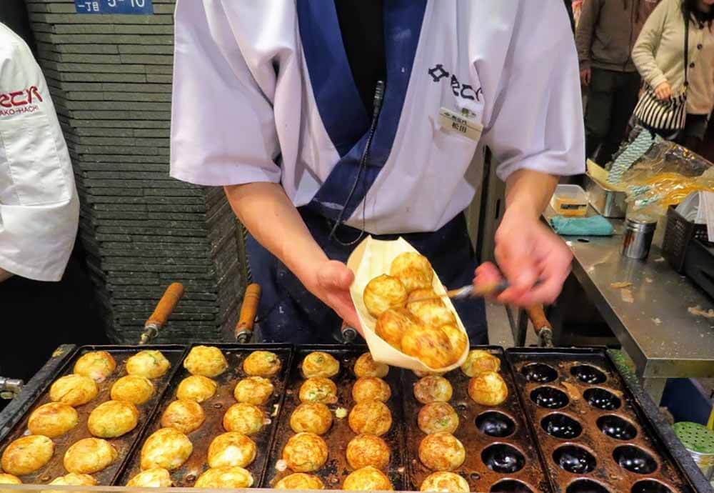 Takoyaki in Osaka, Japan - Pic by Jennifer from Sidewalk Safari