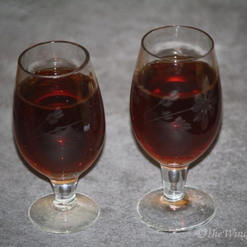 Two glasses with homemade grape wine.