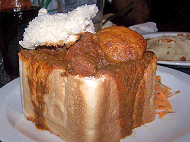 A quarter mutton bunny chow - Pic by Luke Comins from Wiki Commons CC BY-SA 3.0