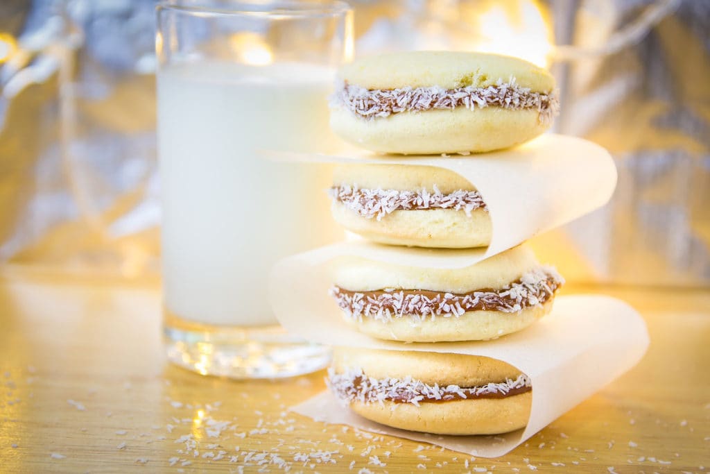 Alfajores in Argentina are two corn cookies stuffed with dulce de leche - Pic by Sara of Deliciously Happy