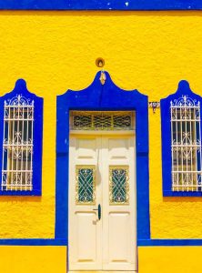 Yellow and blue home wall in Merida, Mexico.