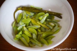 Serve the green garlic pickle in a bowl.