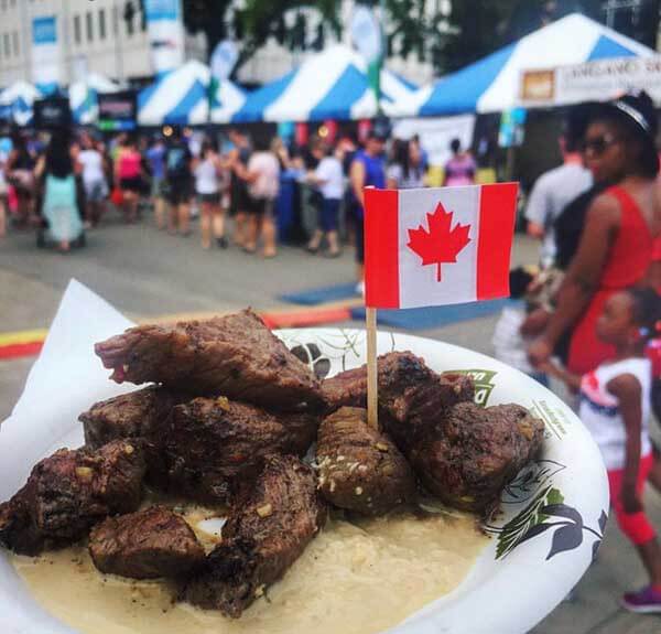 Diced Alberta beef on a plate at a food fair in Canada.