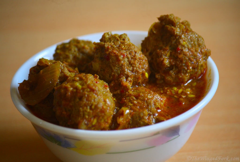 Meat ball pieces in a bowl with curry..