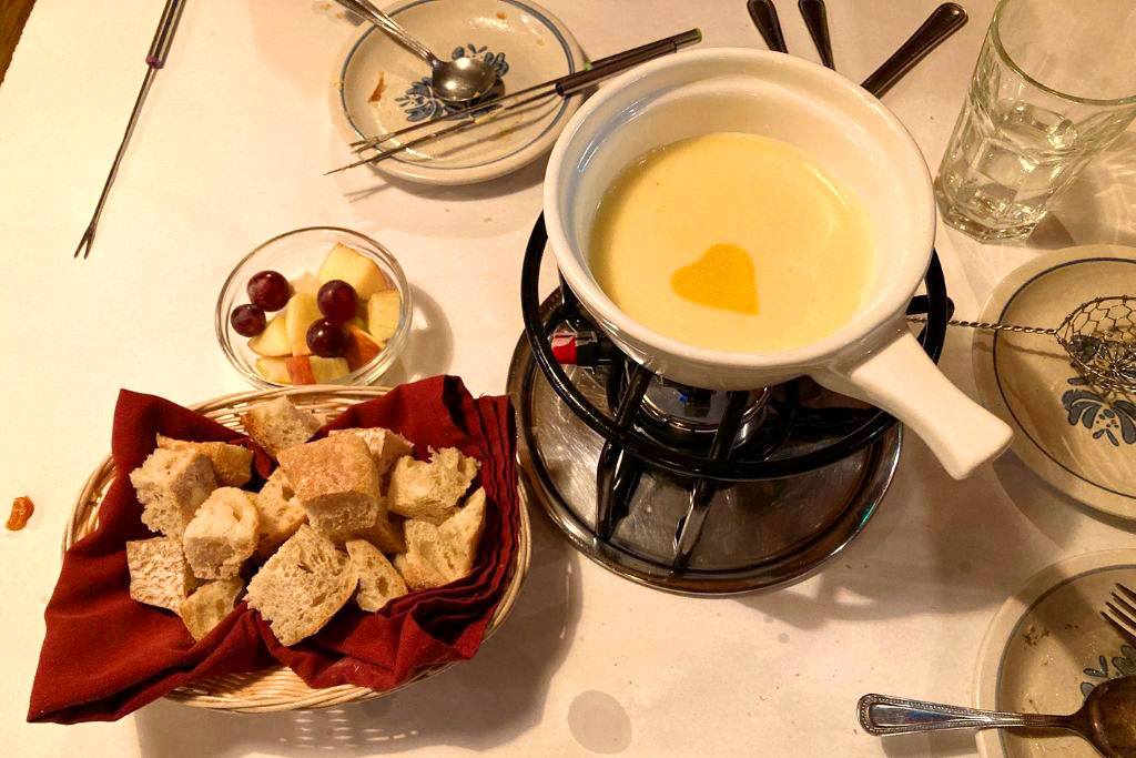 Cheese fondue and croutons at La Fondue.
