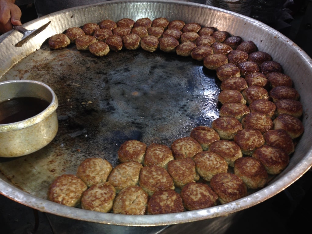 Galawati kebabs on a large tawa.