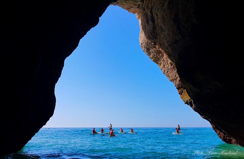 Paddle boarding near the sea cave in Albufeira.